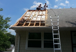 welter construction workers installing new roof on mn home